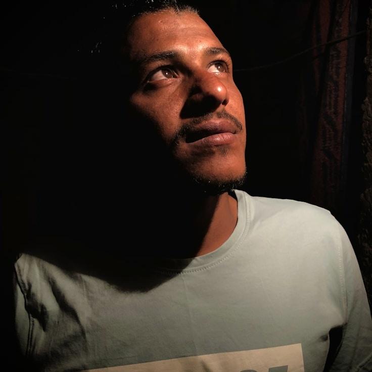 Kaveri Mehta, Lead Design Curator at Adaptive Growth Matrix, reviewing corporate floral arrangements